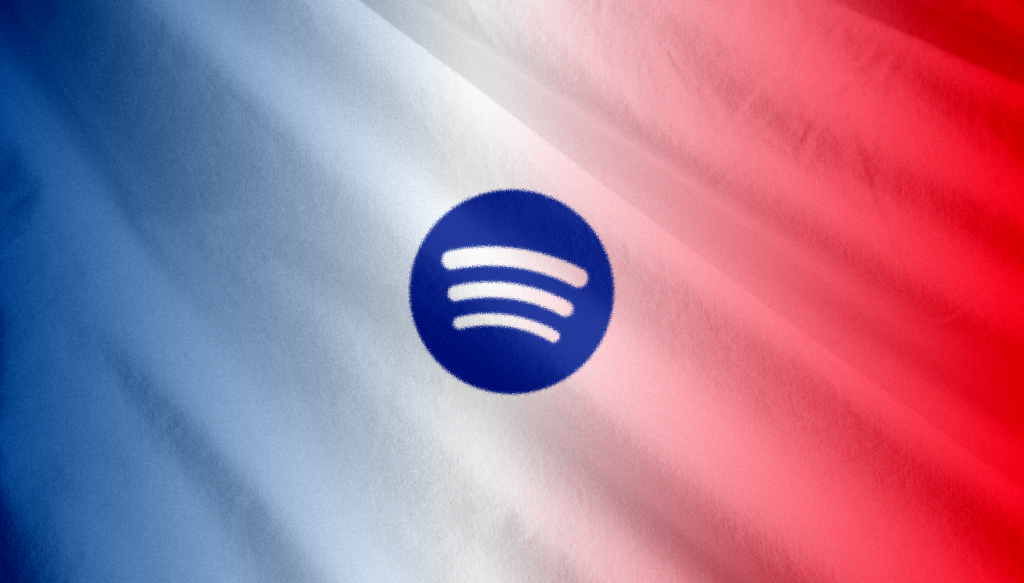 Auriculares sobre un fondo de colores que representan la diversidad de la música global